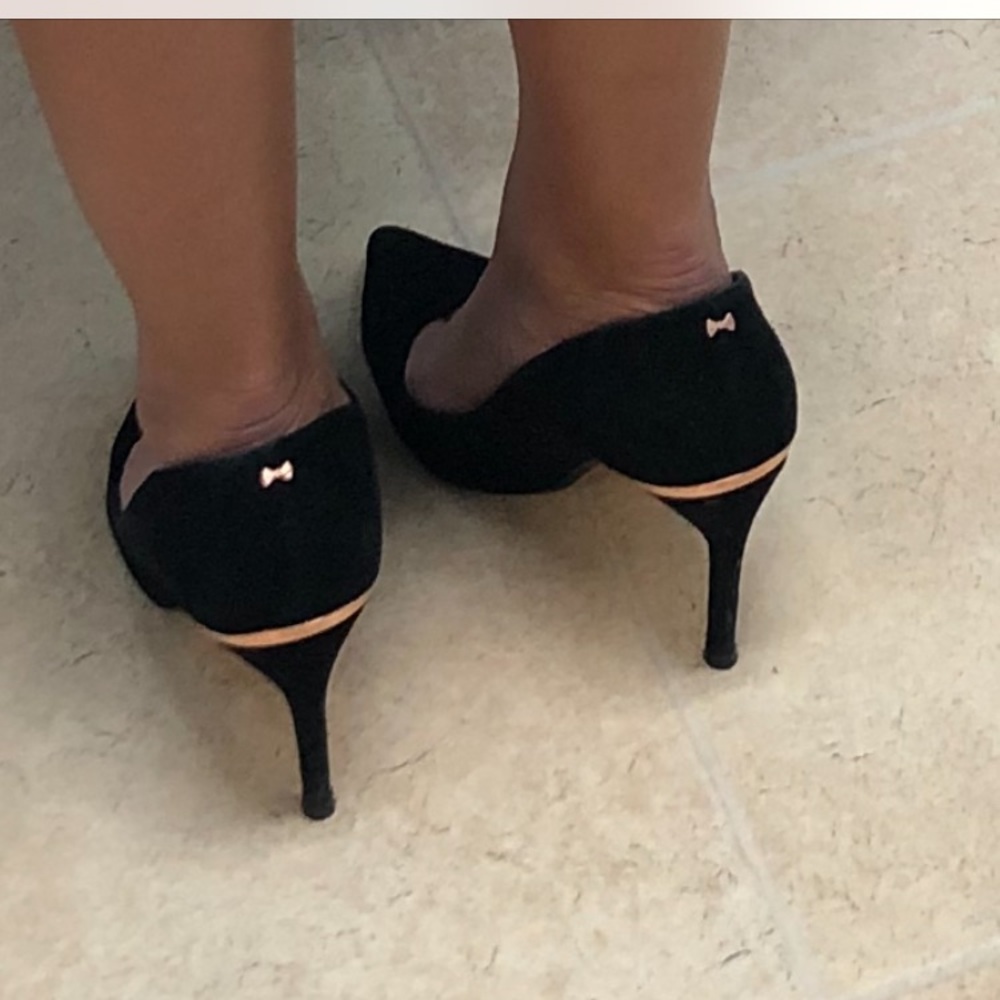 ISO: black pumps with a tiny rose gold bow behind the heel.